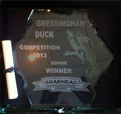- A Rock Tablet, engraved by Sandblast Glass Engraving. The design is of Breahead Foods & the Senior Winner of the 2013 Competition was  Gressingham Duck