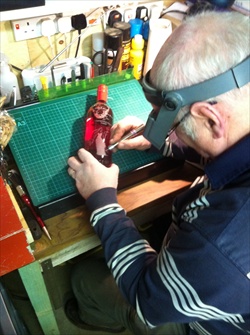 Hand Engraving Glass and Crystal is an art, as this image of Willie Small  shows