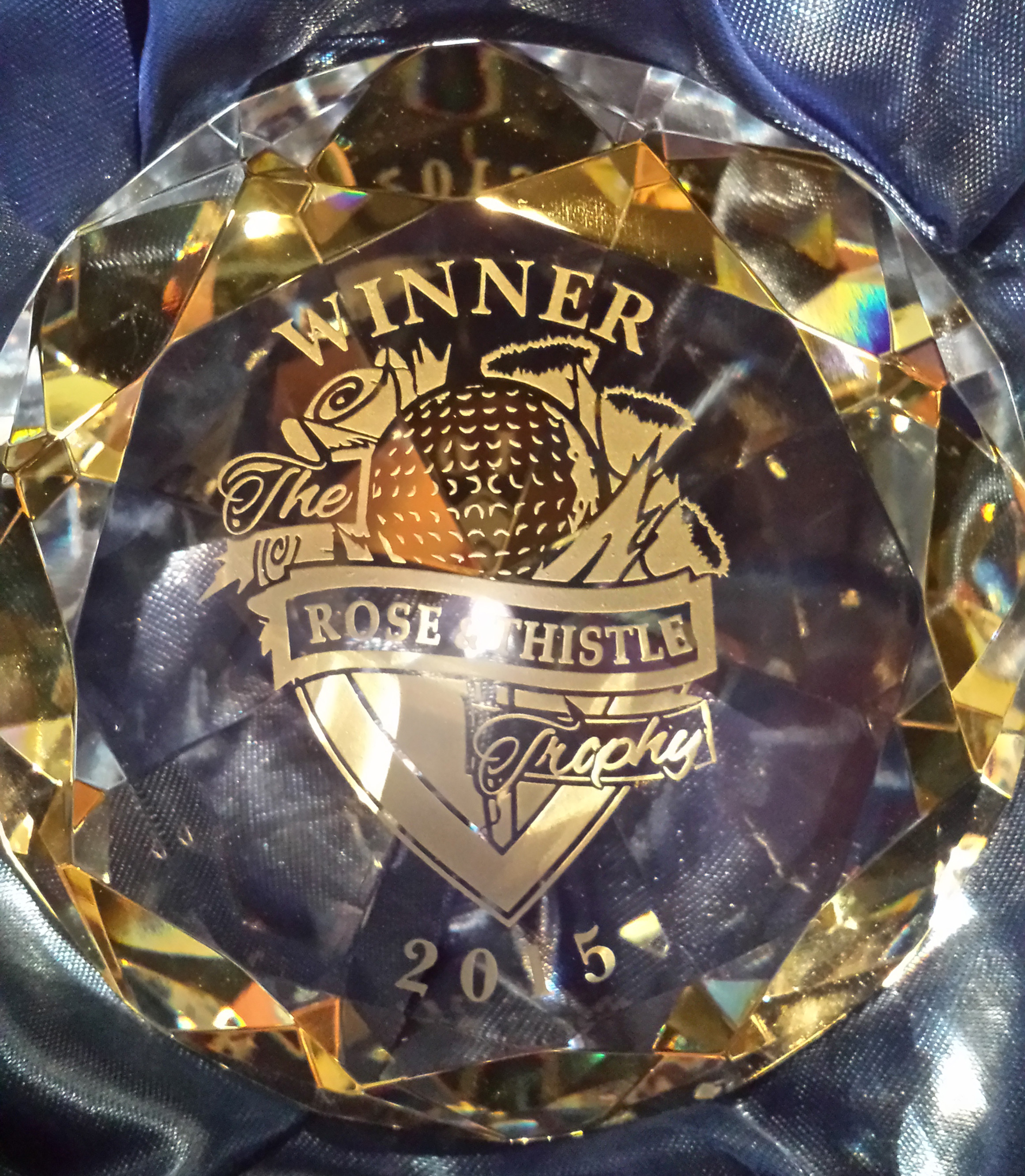 This is a picture of the trophy awarded to the winner of the Rose and Thistle Golf tournament at loch Lomond in 2015.