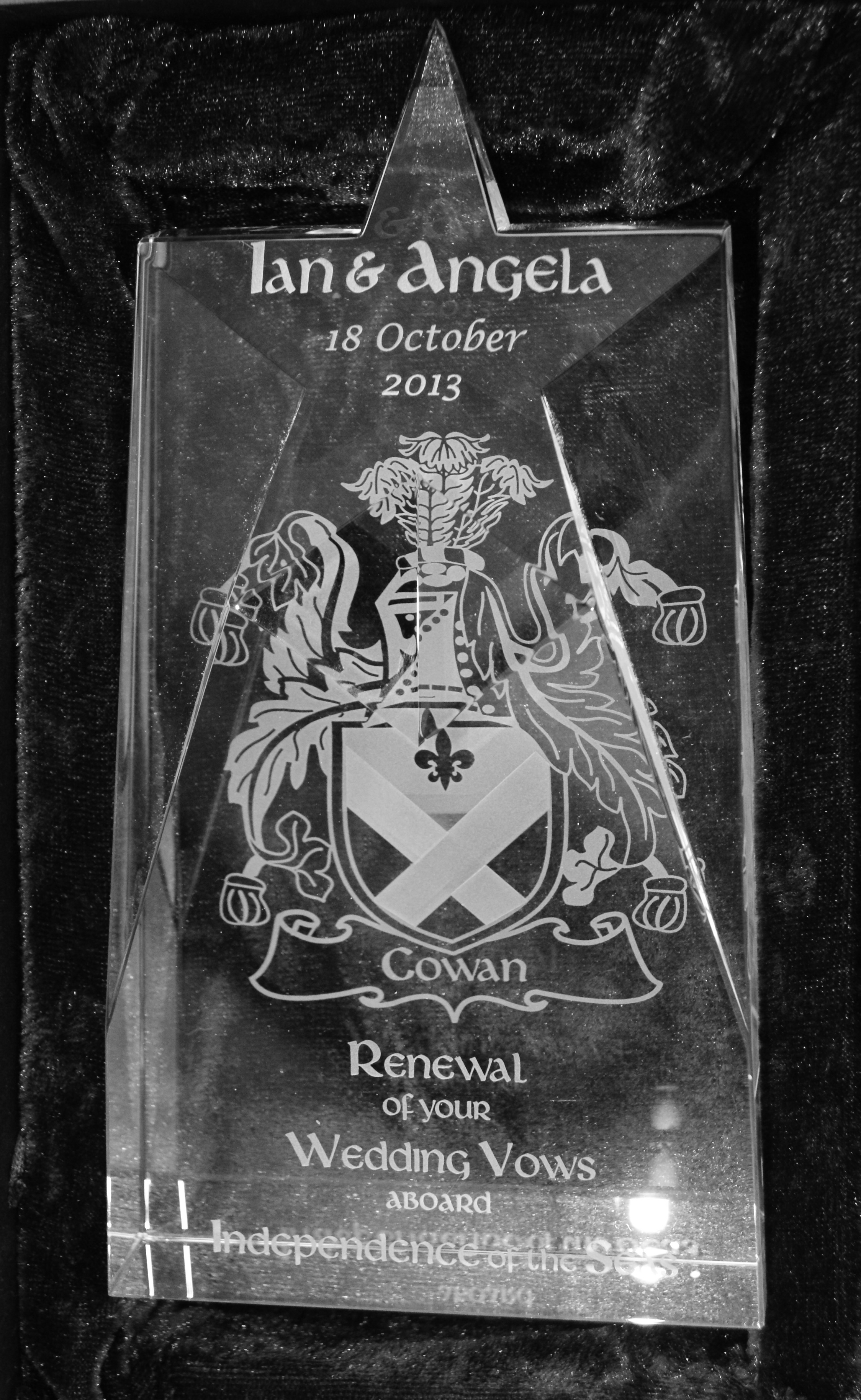 This is a picture of a crystal tower engrave with the crest of clan Cowan